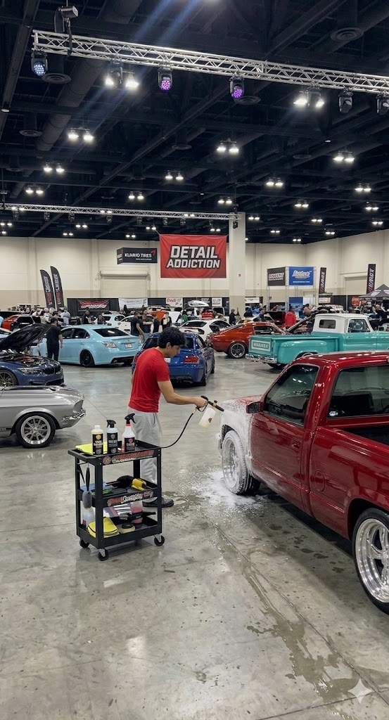 Foam washing a red truck at Super Shine Showcase